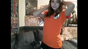 Nerdy girl shows off her dance moves and strips in a Goku-inspired video